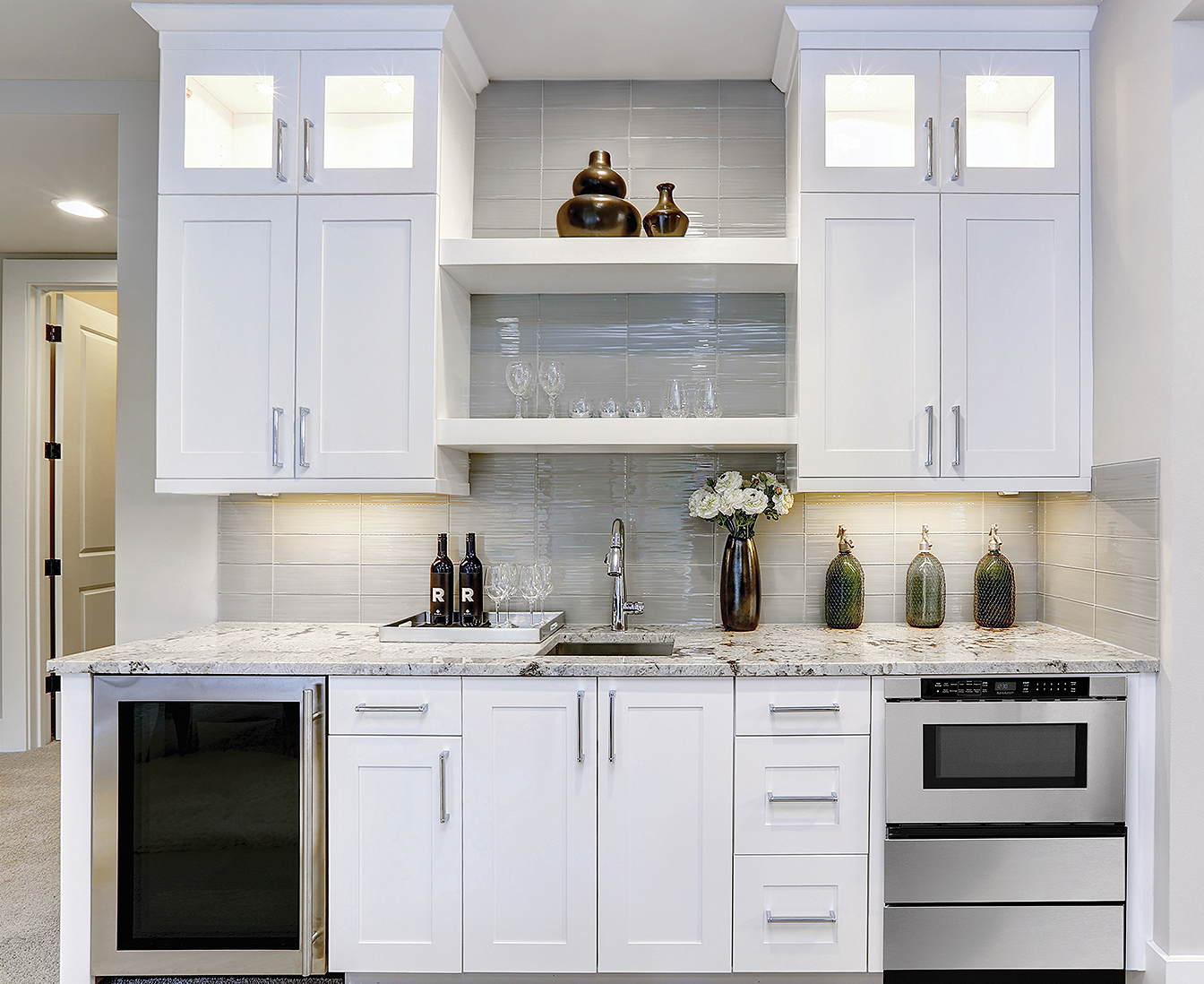 SMD2443JSC Sharp 24 in. Built-In Microwave Drawer in kitchen with other stainless steel appliances